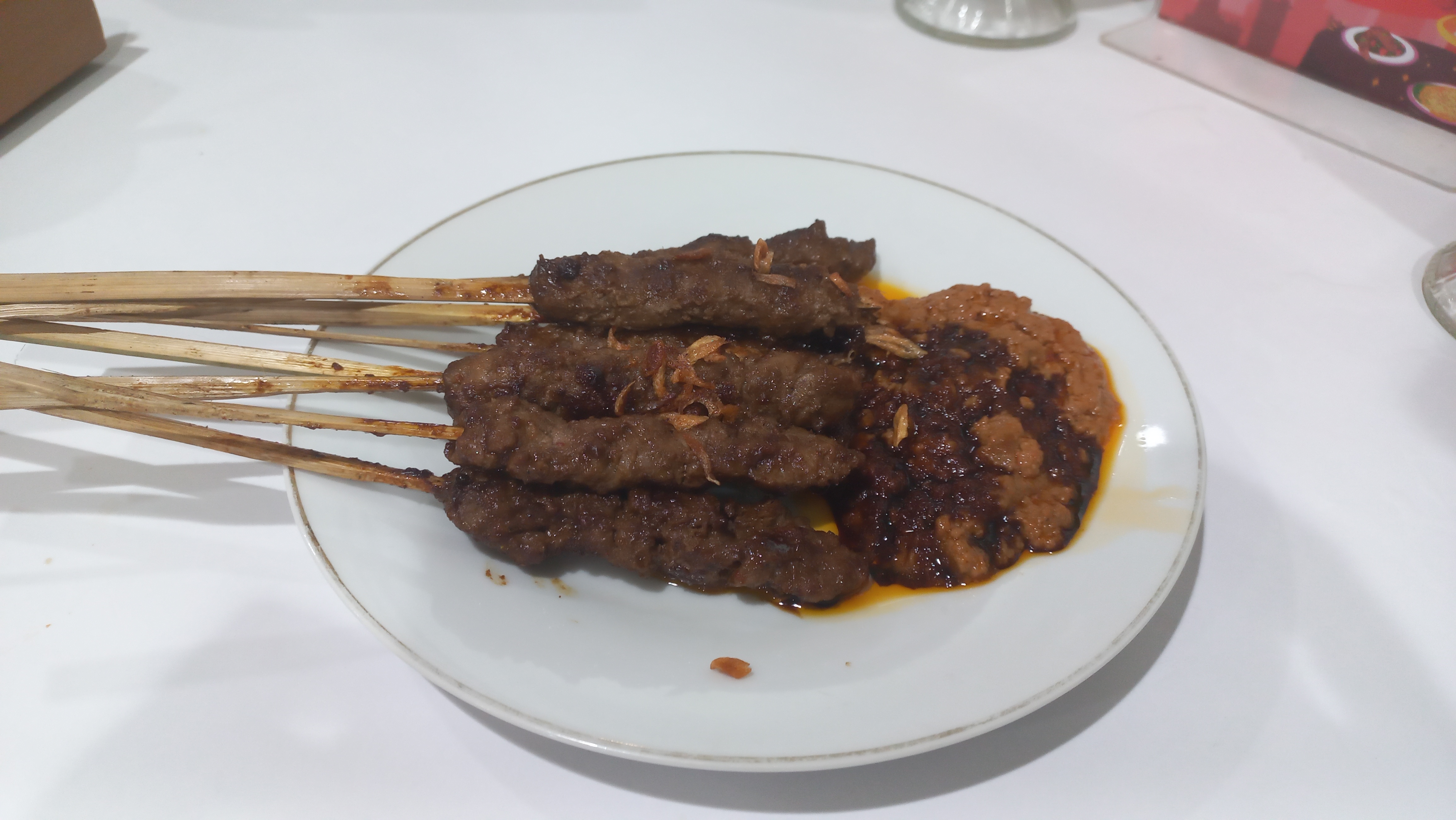 Sate (Sumber Foto: Hypeabis.id/ Kintan Nabila) Sate (Sumber Foto: Hypeabis.id/ Kintan Nabila)